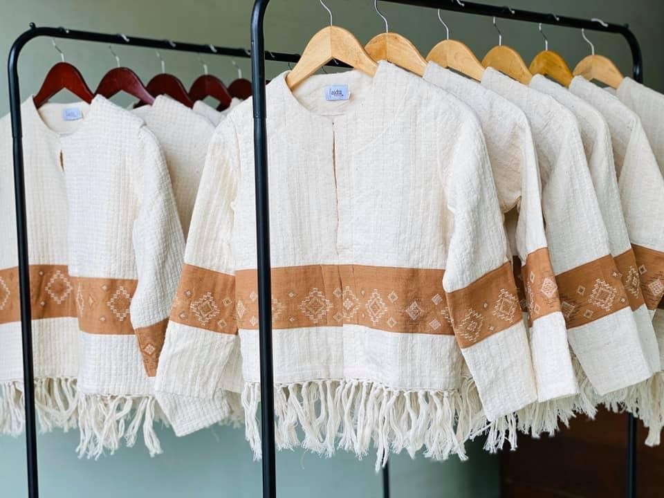 Garments on a rail, reproduced from the Apparel Making project presentation